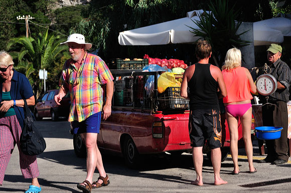 people buying fruit on ithaca greece