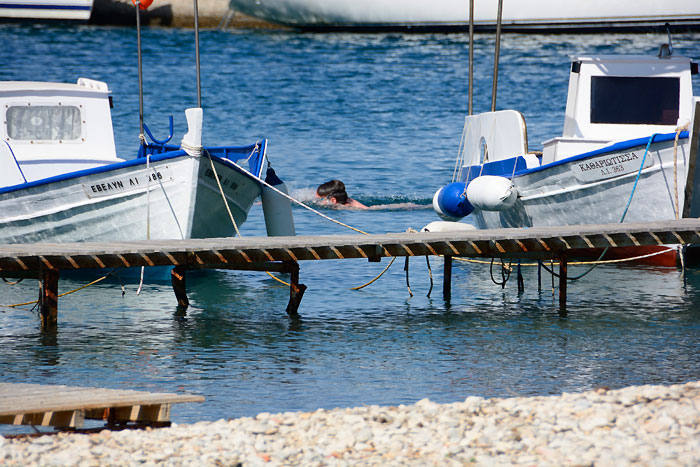 Assos village Mediterranean Sea, Greece. Summer vacation on Greek Island.  by Igor Tichonow. Photo stock - StudioNow